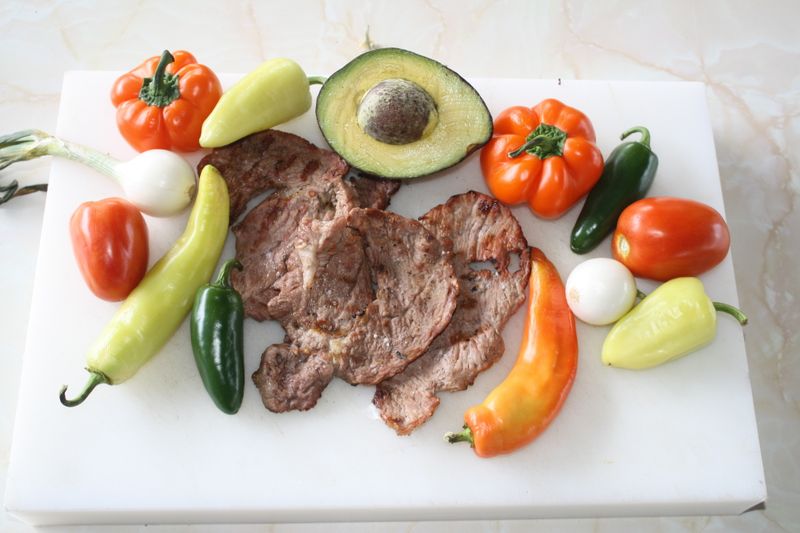 Chuys sizzling steak fajitas with peppers
